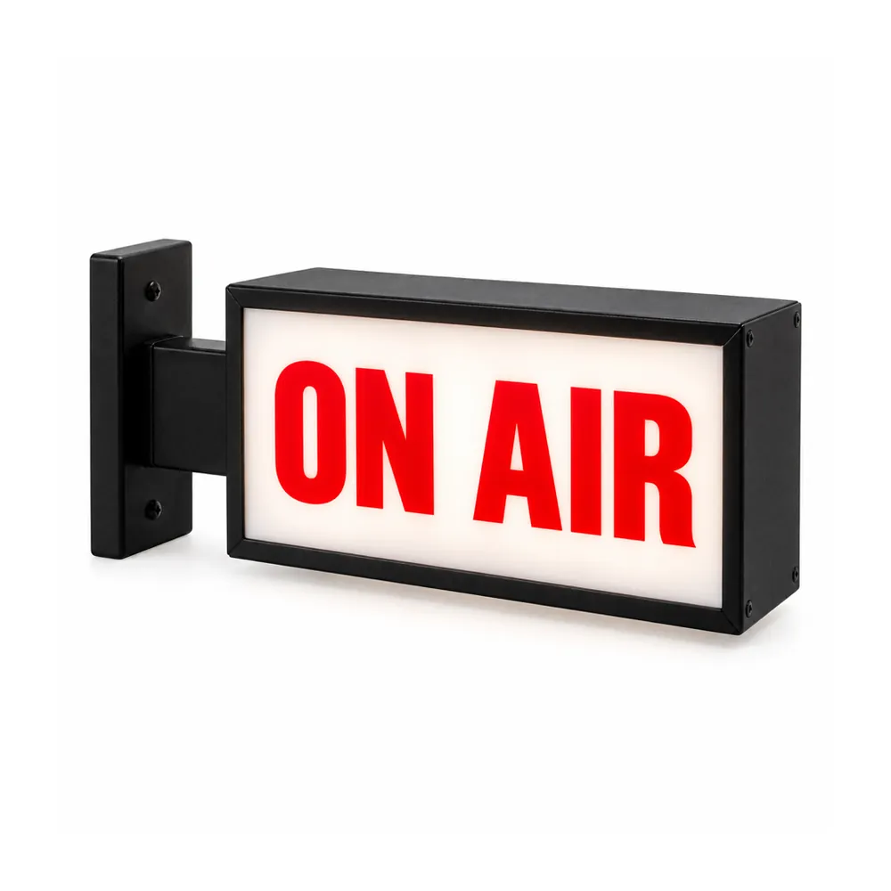 ON AIR light box sign: red letters on a lit white face in a black frame, on a right-angle wall bracket, on a white background
