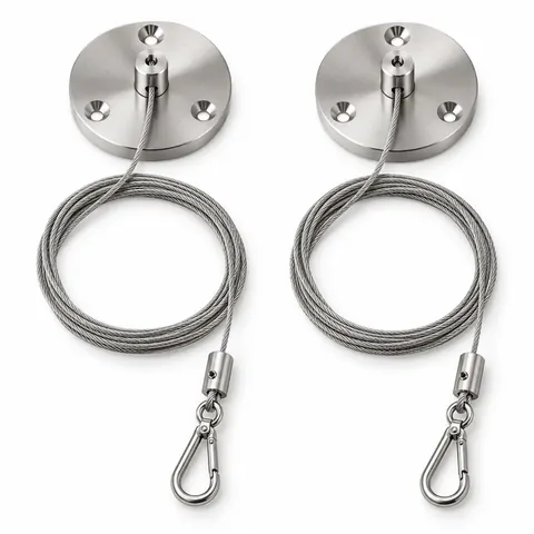 Ceiling hanging kit laid out: two round ceiling discs, thin steel cables and grippers with snap hooks, on a white background