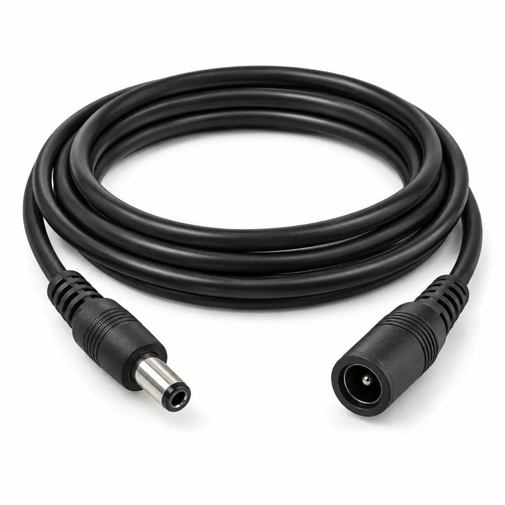 Black DC extension cable for LED neon signs, coiled, with a barrel plug at one end and a barrel socket at the other, on a white background